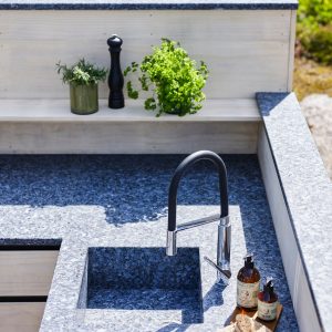 Outdoor kitchen worktop with Lundhs Royal natural stone.