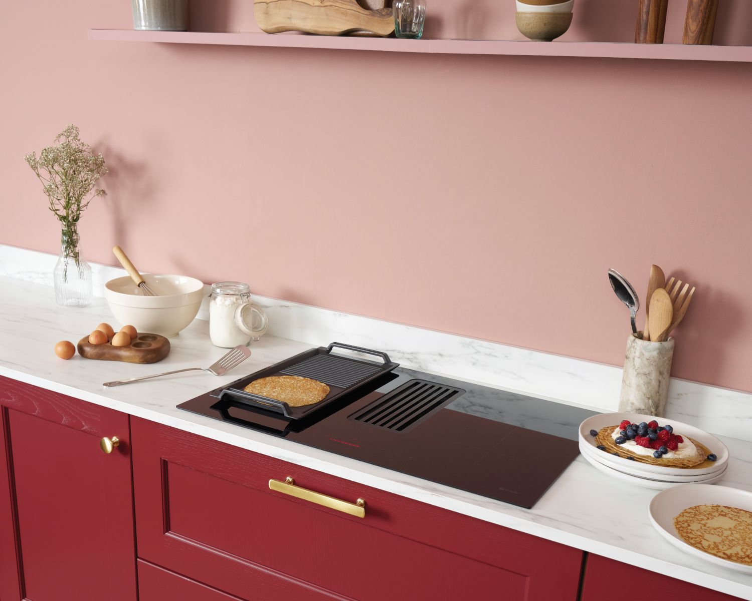 Caple-has-introduced-the-DD782BK-78cm-induction-hob-with-downdraft-extractor