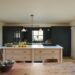 A-flint-cottage-kitchen-east-coast-England-with-a-refined-shaker-design-by-deVOL